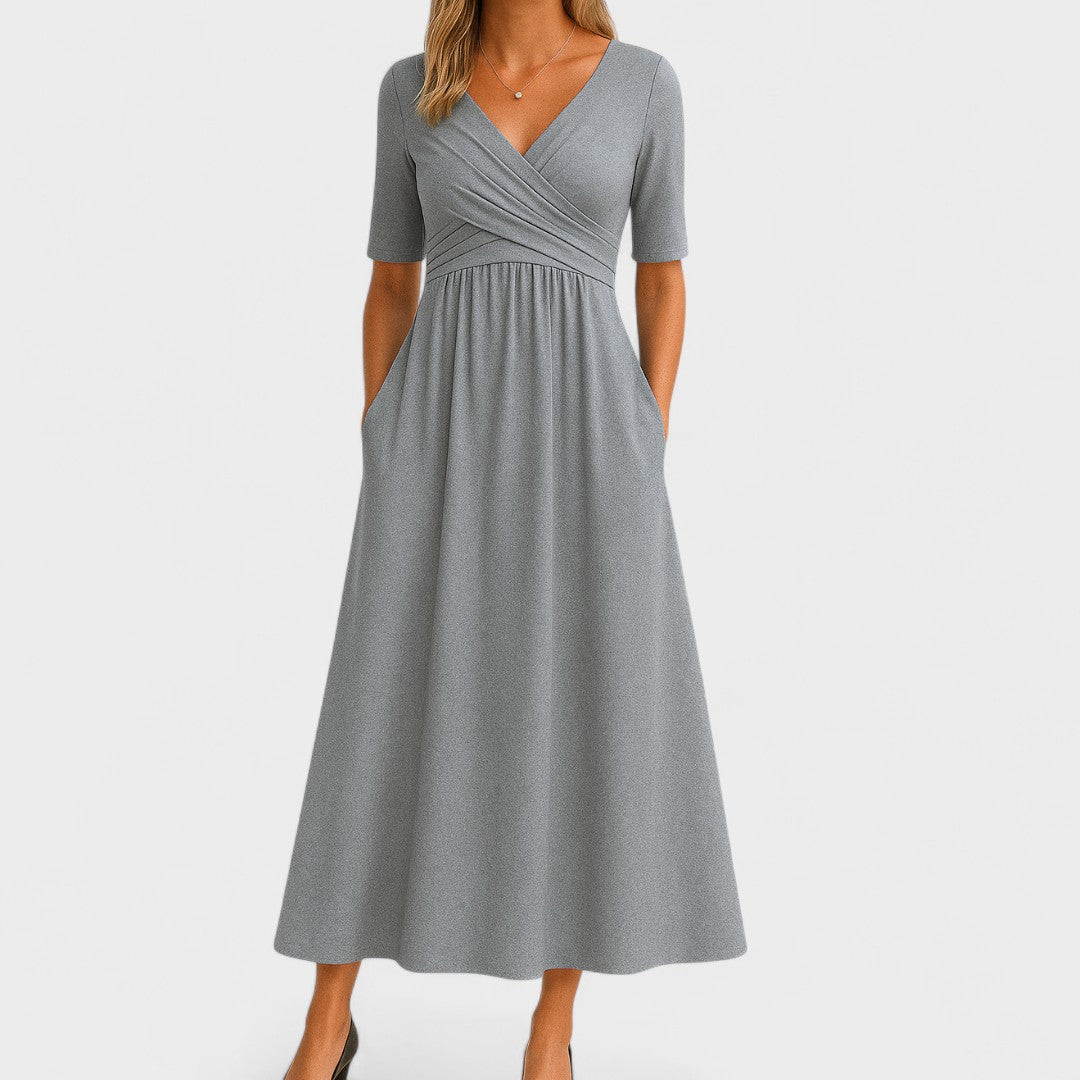 Elegant women's V-neck midi dress, perfect for cocktails or parties. Chic summer fashion.