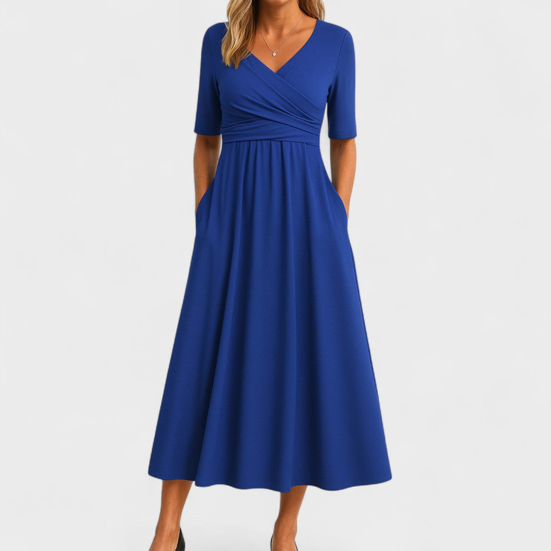 Fashionable women's midi dress with V-neck, suitable for parties. Elegant and comfortable.