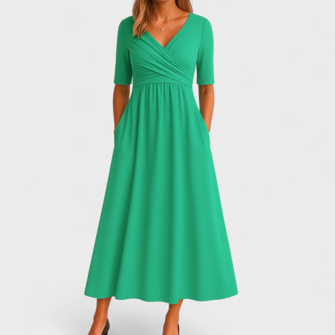 Stylish women's V-neck dress, a versatile midi length for casual or party wear. Modern fashion.