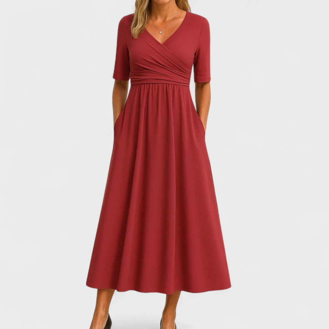 Elegant women's summer midi dress with a flattering V-neck. Perfect party clothing.