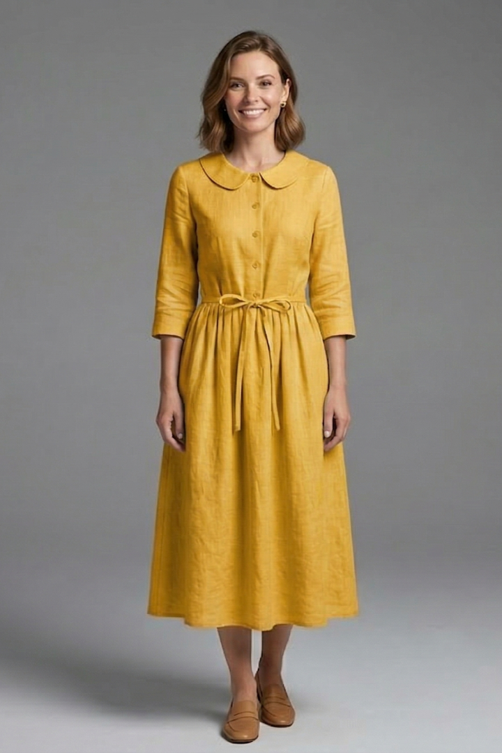 Beautiful women's V-neck midi dress with a waist tie, offering elegance and versatile styling options.