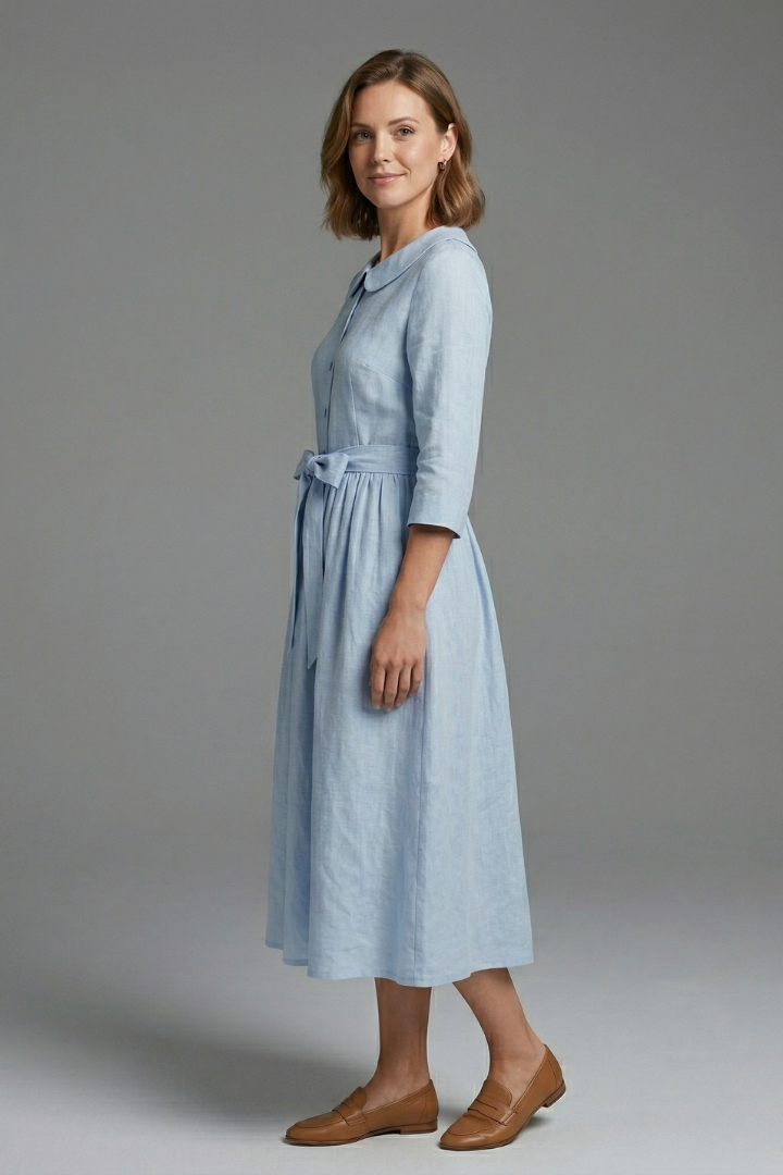 Versatile V-neck midi dress with waist tie in a sophisticated design, a women's wardrobe essential.