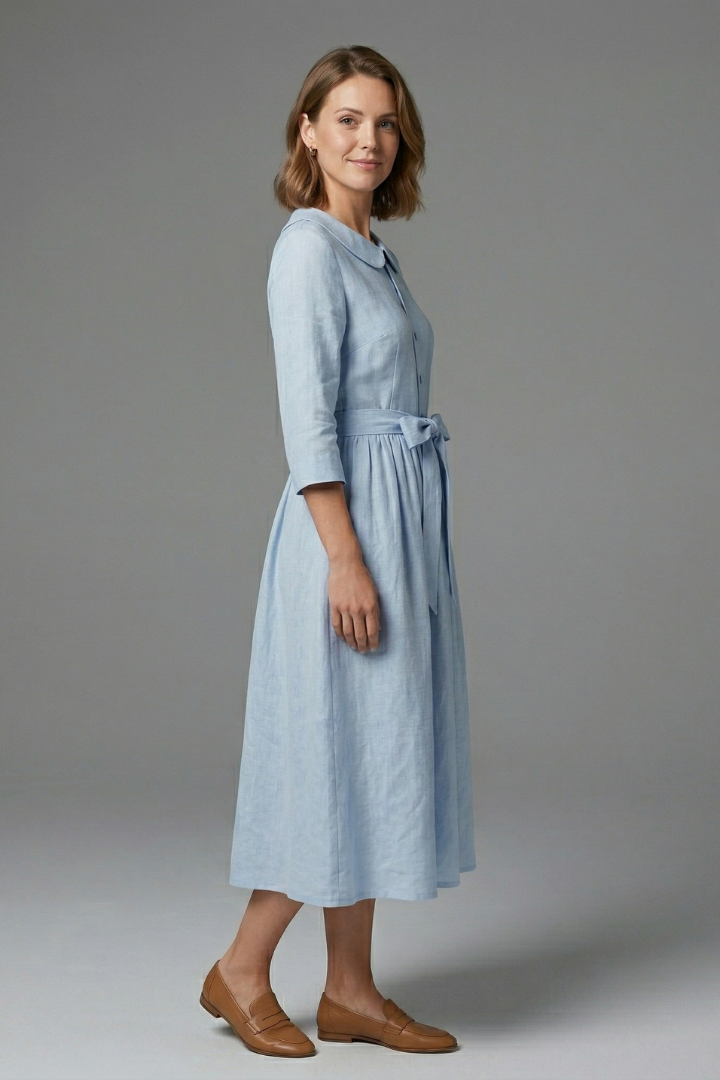 Flattering women's sleeveless midi dress with a V-neck and adjustable waist tie, great for any party.