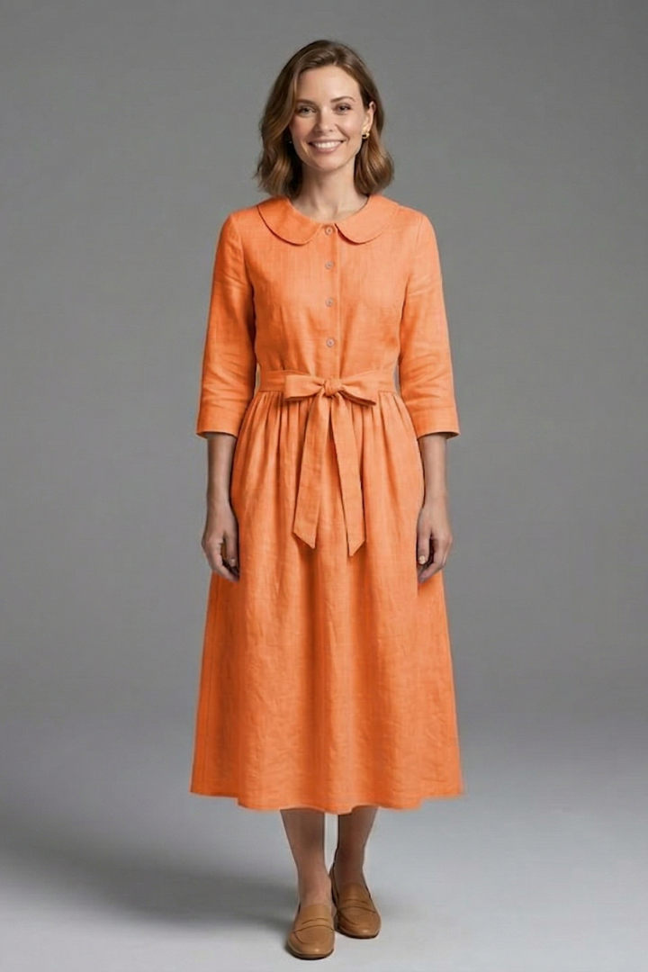 Chic women's V-neck midi dress with a cinching waist tie, offering a flattering and versatile look.