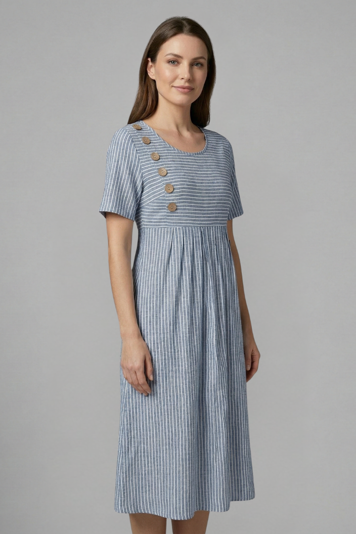 Fashionable women's midi dress, designed with a sophisticated V-neck and delicate button detailing.