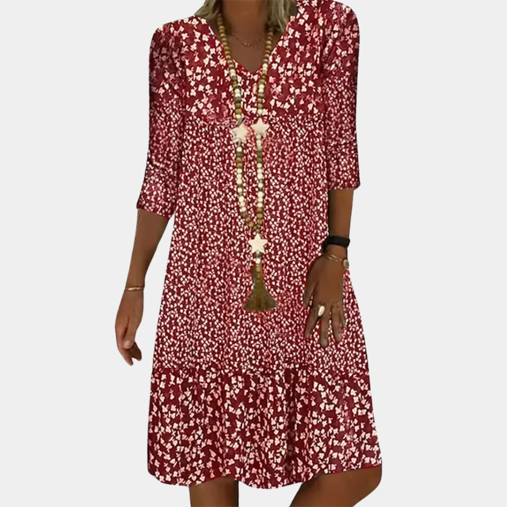 Chic women's V-neck midi summer dress with short sleeves. An elegant and comfortable choice for versatile everyday fashion.