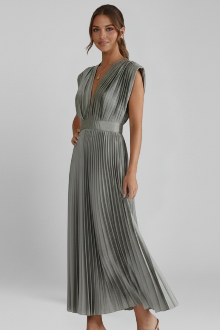 Model wearing a chic women's V-neck pleated midi dress, ideal for elegant summer events & party wear.