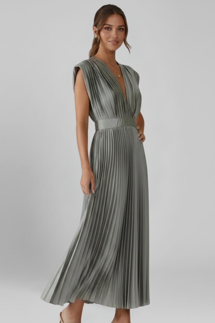 Side view of an elegant women's V-neck midi dress, showcasing its flowing pleated skirt and sleeveless cut.