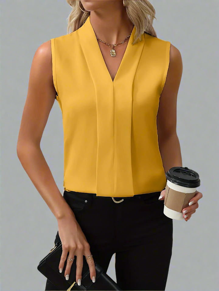 Polished V-neck sleeveless top for women, a smart choice for business attire and sophisticated daily wear.