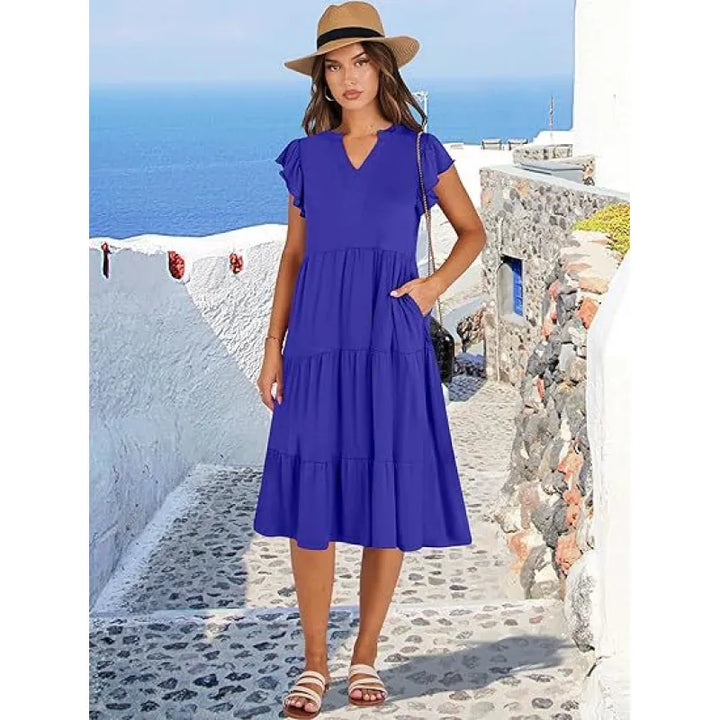 Elegant women's V-neck tiered midi dress with flutter sleeves, ideal for summer casual or party wear.