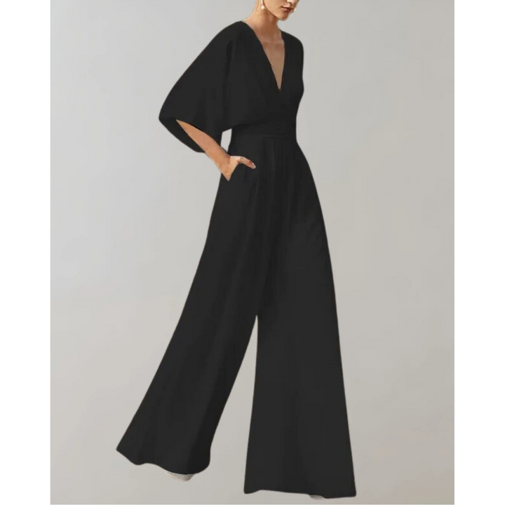 Formal V-neck wide leg jumpsuit for women. Elegant and flowy one-piece, suitable for evening wear & special occasions.