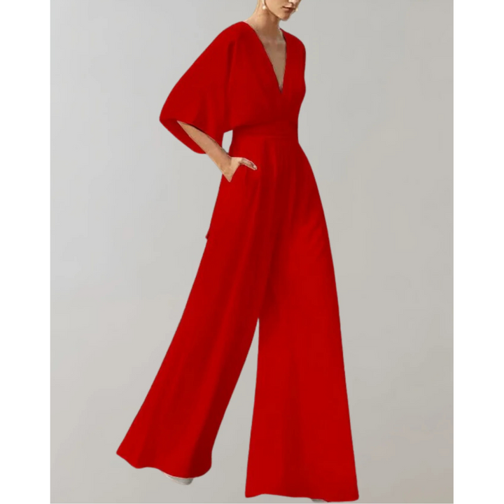Women's elegant flowy V-neck jumpsuit with wide legs. A comfortable and chic one-piece for formal or party wear.