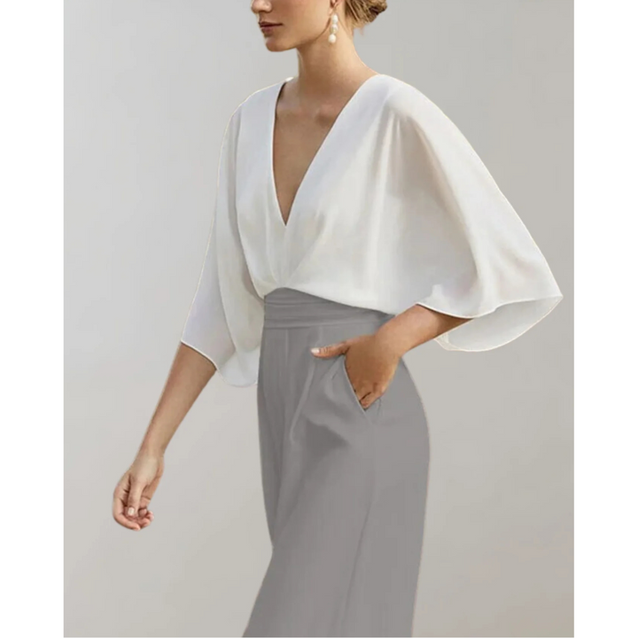 Sophisticated women's V-neck wide leg jumpsuit. Elegant flowy one-piece outfit, ideal for formal and party occasions.