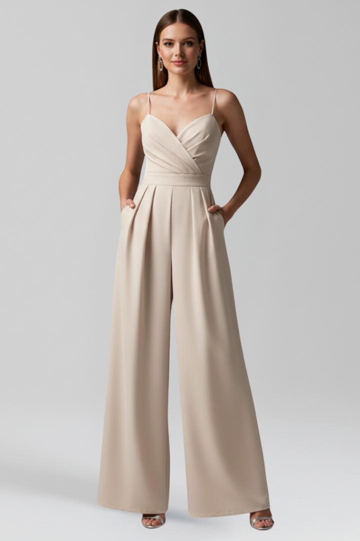 Comfortable women's V-neck wide leg jumpsuit. Elegant sleeveless design for summer versatility.