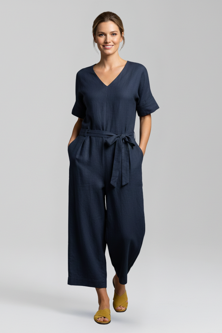 Easy pull-on women's V-neck jumpsuit, long sleeve, wide leg, with an adjustable waist tie for perfect fit.