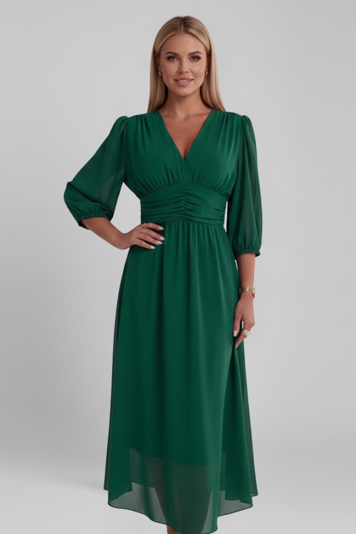 Flattering women's wrap midi dress featuring a stylish V-neck and long sleeves, creating an elegant silhouette.