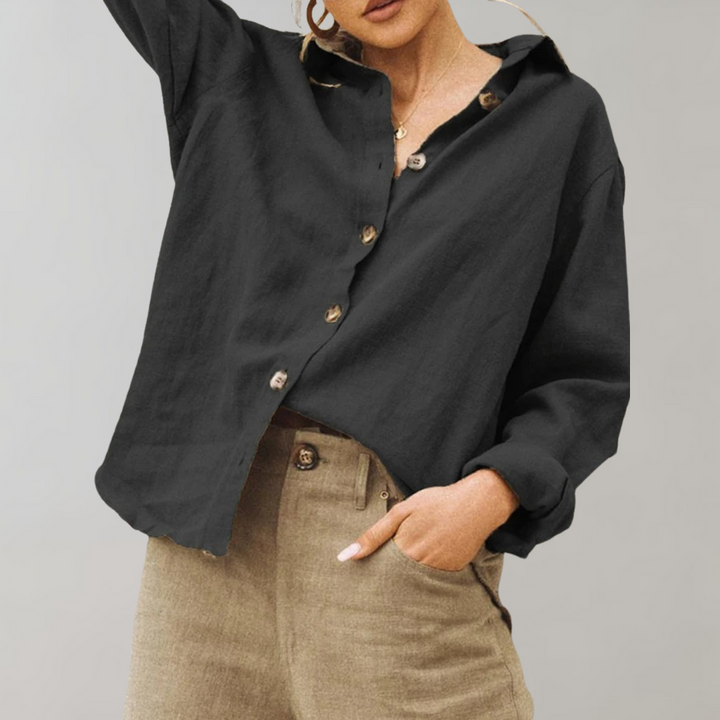 Elegant women's vintage button-down blouse with long sleeves, perfect for chic, versatile styling.