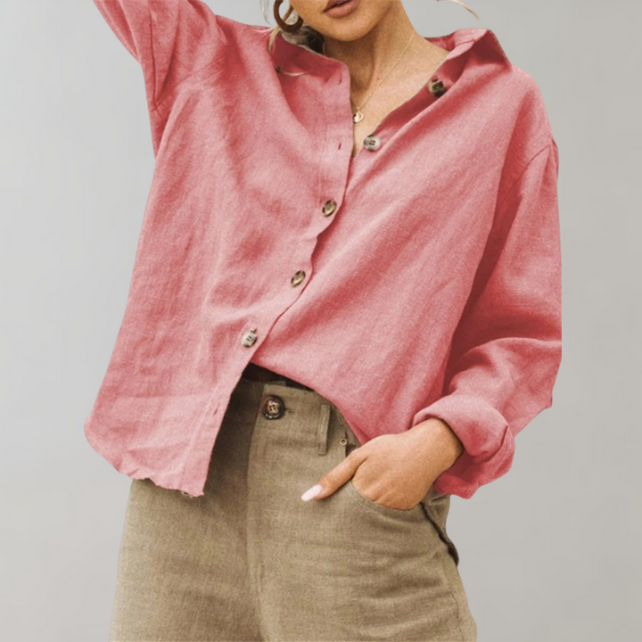 Women's oversized vintage button-down blouse, elegant and relaxed fit, ideal for stylish spring fashion.