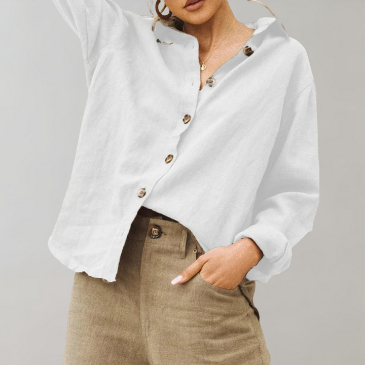 Long-sleeve women's elegant vintage button-down top, a versatile collared blouse for chic everyday style.