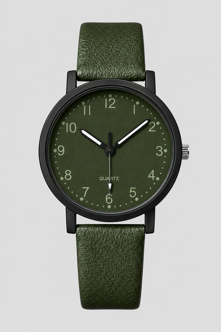 Close-up of an elegant women's vintage watch showing its timeless dial and classic leather wrist strap.