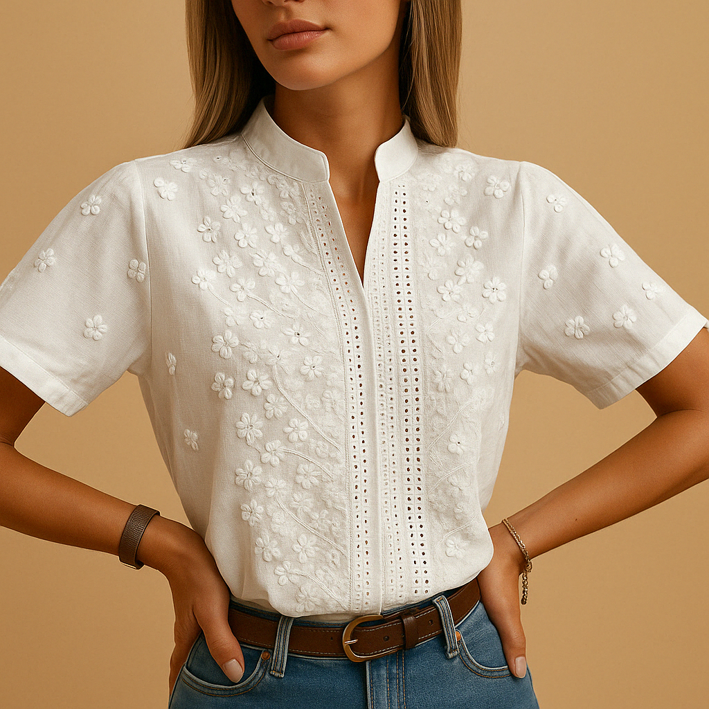 Timeless white women's blouse with classic collar, comfortable and stylish for office wear or elegant casual fashion.