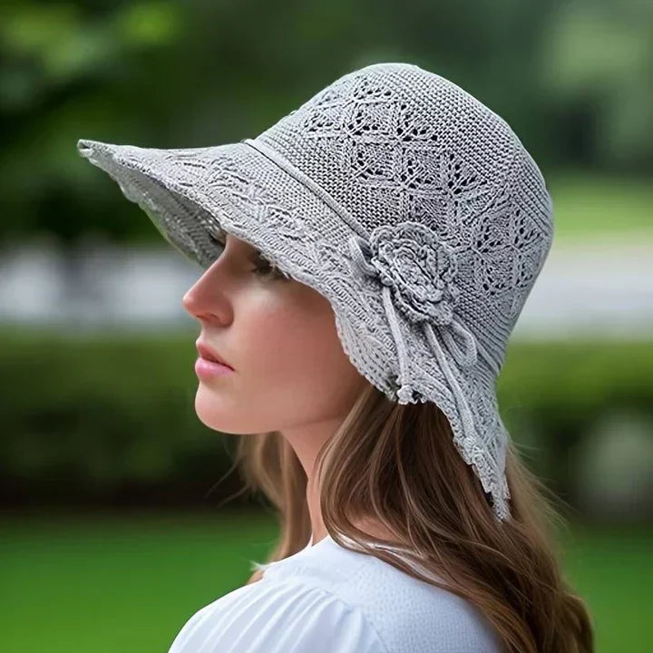 Foldable wide-brim sun hat for women. Ideal travel & beach accessory for summer style.