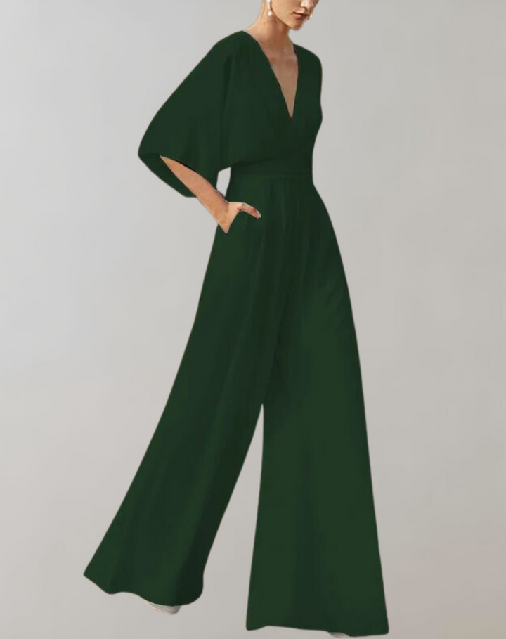 Full length view of a women's elegant wide leg jumpsuit. Chic formal evening wear, comfortable & stylish.