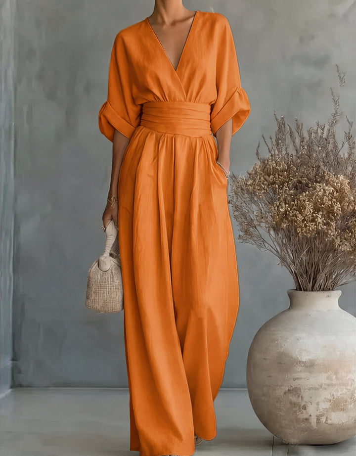 Comfortable women's one-piece wide-leg jumpsuit, featuring a chic wrap front for elegant summer style.