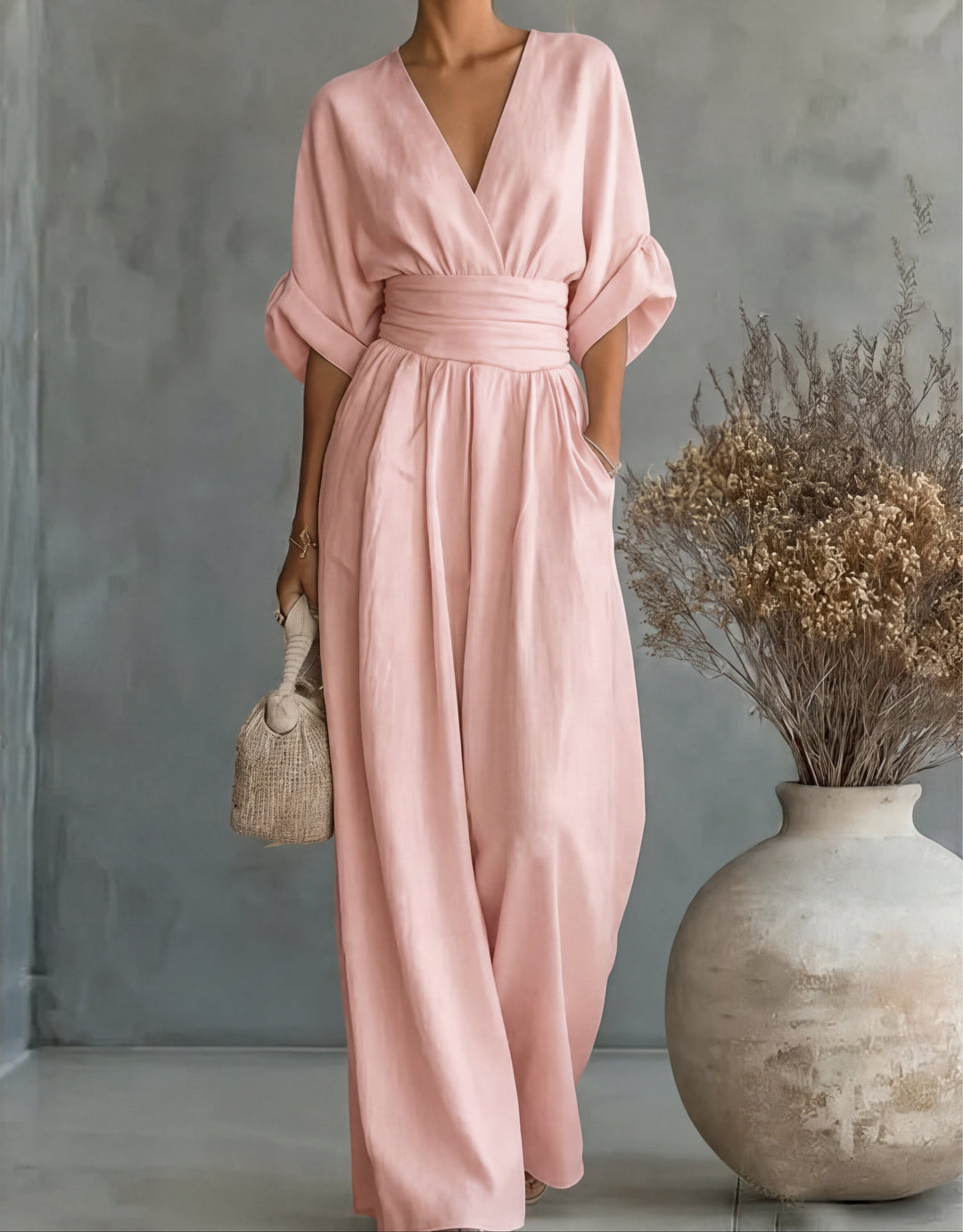 Fashionable women's wide-leg jumpsuit: comfortable, versatile, and elegant with a stunning wrap front.