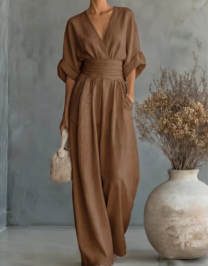 Relaxed fit women's wide-leg jumpsuit for casual chic, featuring an elegant wrap front for comfort.