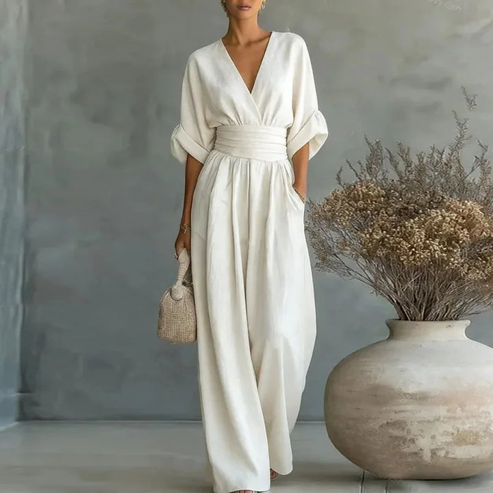 Complete day-to-night outfit: elegant women's wide leg jumpsuit with cinched waist for versatile style.