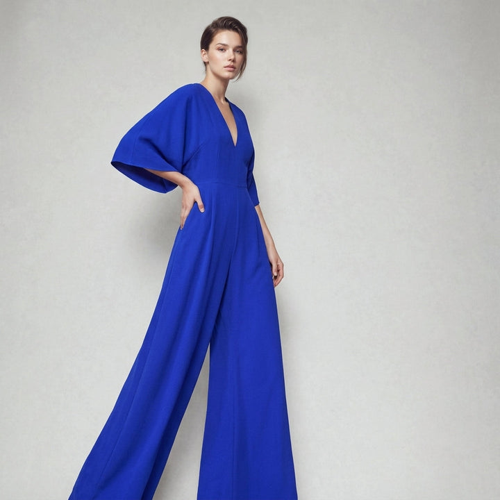 Chic wide-leg women's jumpsuit, comfortable and versatile with elegant flowing sleeves and V-neck design.