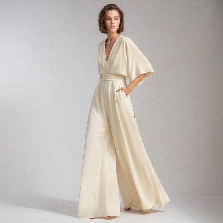Comfortable and elegant women's jumpsuit, wide-leg design with flowing sleeves. Chic V-neck for versatile style.