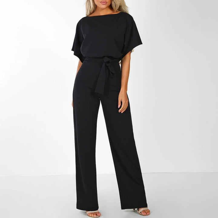 Boat neck wide-leg jumpsuit for women with a self-tie belt. Versatile for casual chic or elegant occasions.