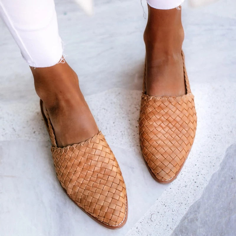 Elegant women's woven pointed toe slip-on mules in flat style, perfect for office or casual wear.