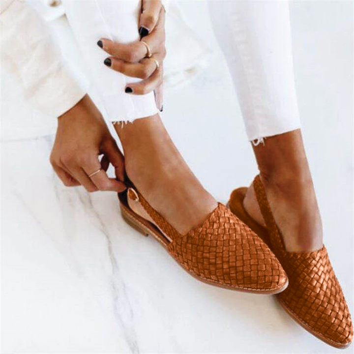 Everyday elegant women's mules. Pointed toe, comfortable slip-on flats with stylish woven detail, ideal for any outfit.