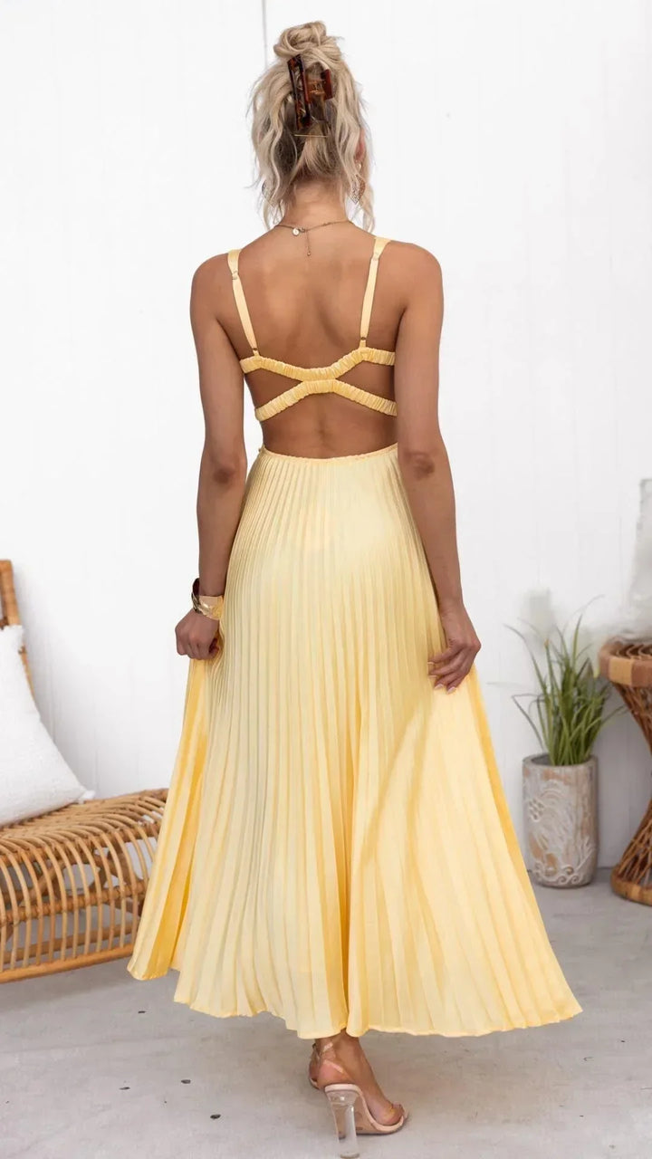 Occasional women's long yellow dress featuring elegant pleats and a V-neck