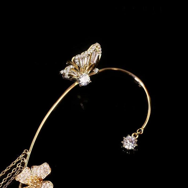 Luxurious women's butterfly earrings with dazzling zircon and graceful tassel, party-ready.
