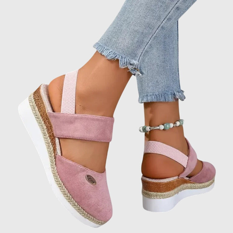 ELUXOR women's walking sandals, paired with a summer dress, offering comfort & style.