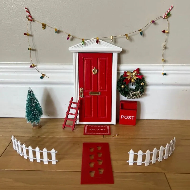 Miniature festive elf door with sparkling snow details and tiny garland, a charming holiday gift