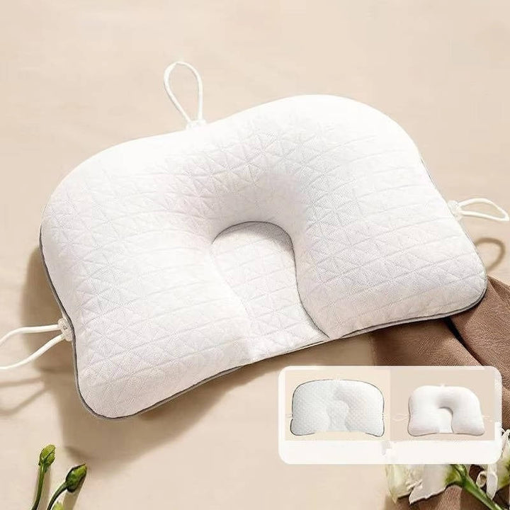Newborn ergonomic pillow for safe sleep, preventing flat head syndrome. Essential infant support & comfort.
