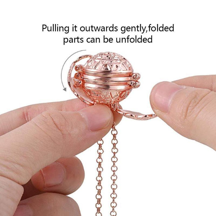 Intricate silver angel wing photo locket, a sentimental memory holder and women's jewelry.