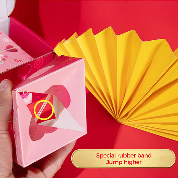 Group of Exploding Surprise Gift Boxes in various colors, ideal for multiple party favors.