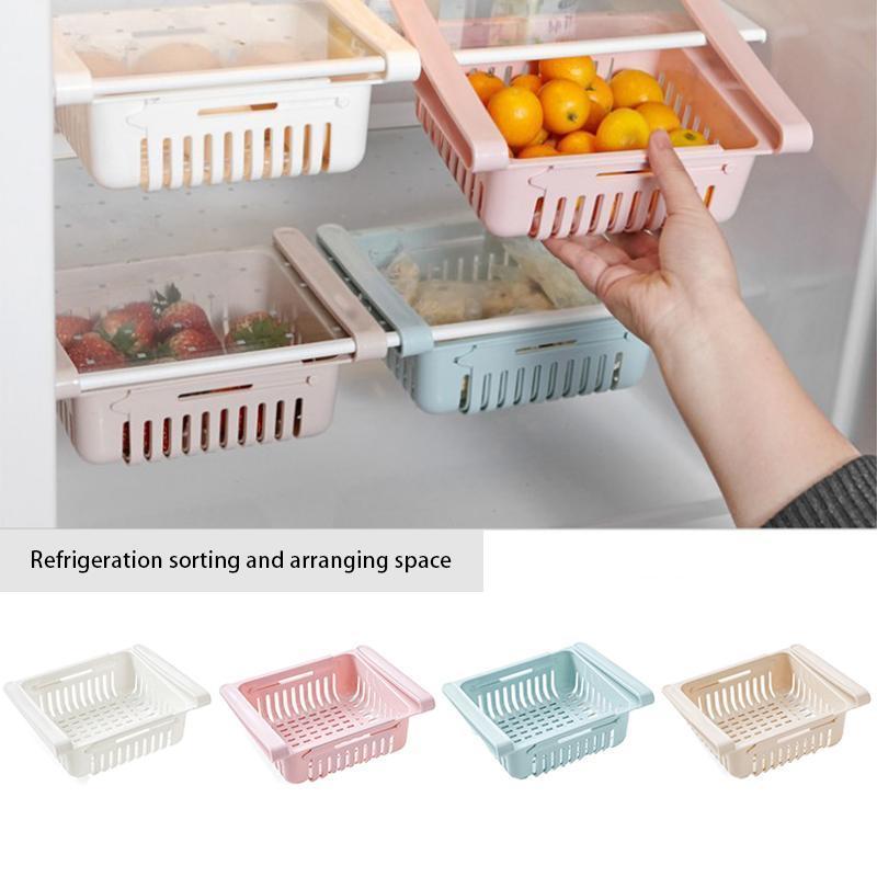White plastic refrigerator drawer rack, extendable for cabinet and food storage