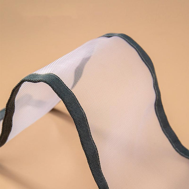 Close-up of a fabric closet organizer, showing individual cells for underwear separation