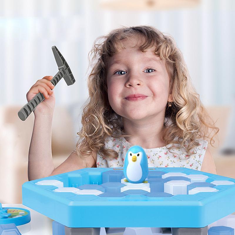 Close-up of the Penguin Ice Breaker Game board with penguin figure, a fun family game.