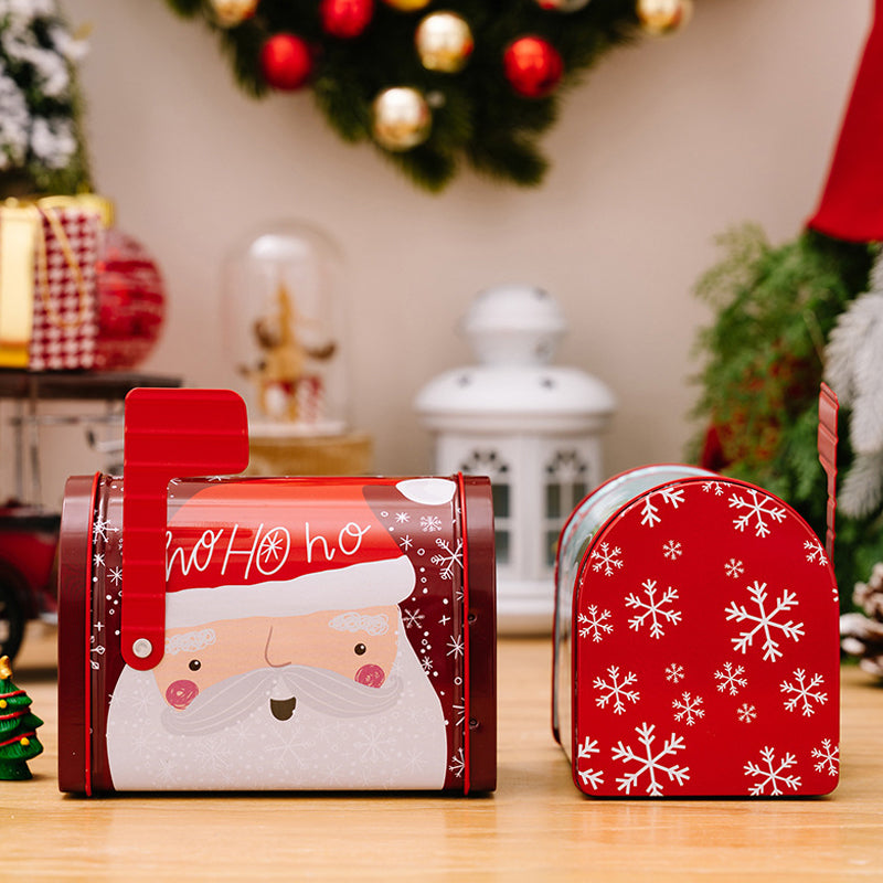 Red Christmas gift box tin with various holiday character designs, candy container