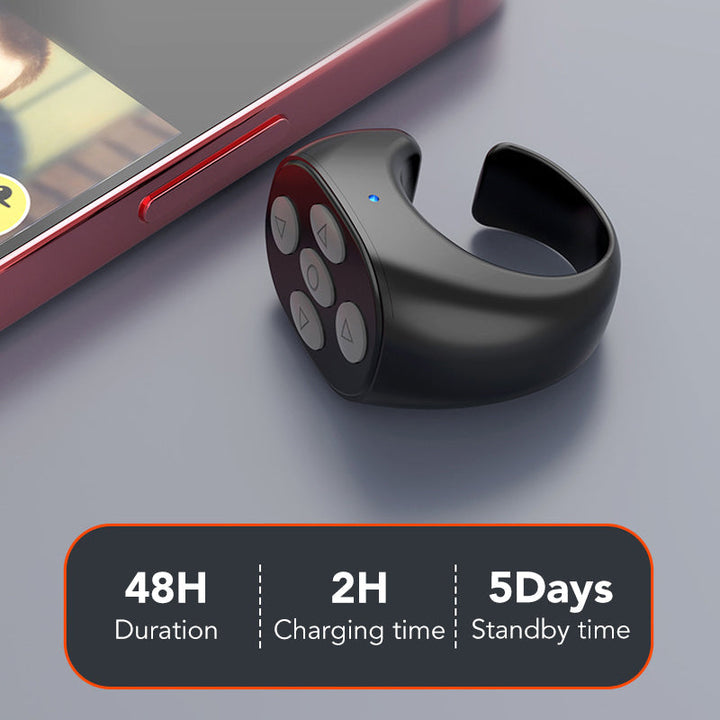 Hands-free selfie remote: Fingertip Wireless Bluetooth Control Ring shown in use with smartphone