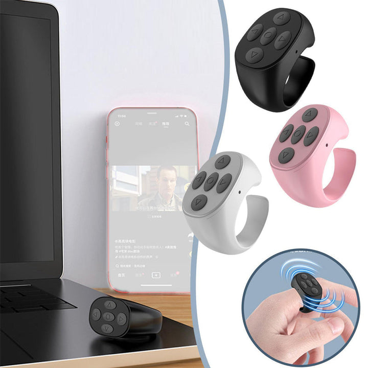 Fingertip Wireless Bluetooth Control Ring on a table, ready to be paired with a device