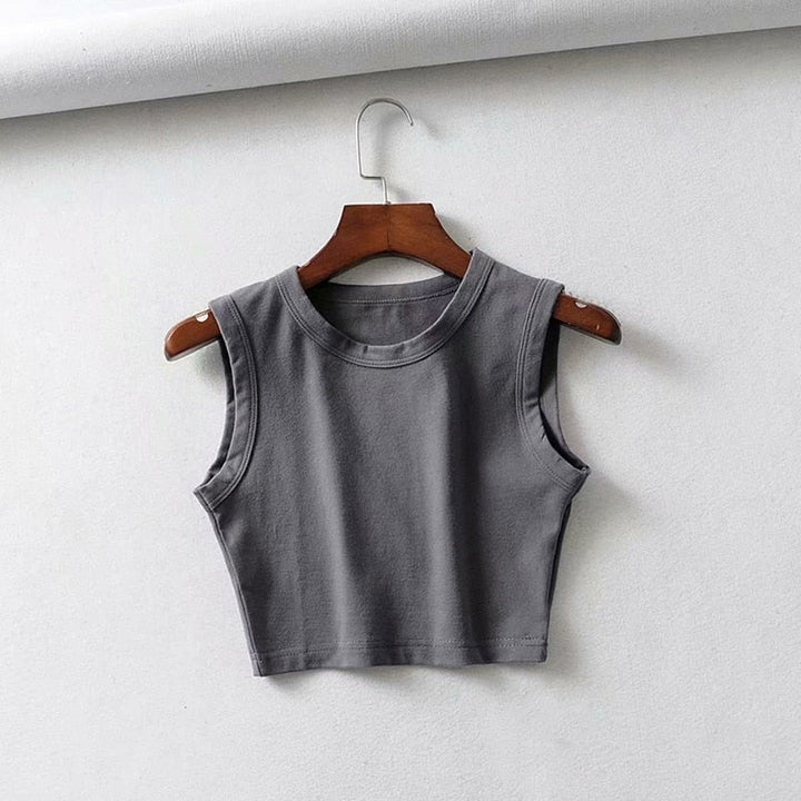 Breathable women's sleeveless crop top, fitted for lightweight comfort during warm summer days.
